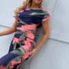 Carbon jumpsuit in navy & coral floral at www.preselyblue.ie
