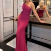 This design says simplicity with a twist. The giant satin shoulder bow steals the show, available in either a matching or contrast colour. A slim silhouette is crafted using our luxury Crepe fabric. Martini is a must-have. This dress is made-to-order especially for you. Available in over 50 colours, in either Crepe, Satin or Chiffon. Pictured in colour Black/Ivory & Merlot/Seashell. Model wears a size UK10.