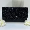 Black Sequin Clutch Bag L x W x H: 22 x 5 x 13cm One silver metal long chain included Sequin glitzy 