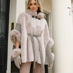 Pia Rossini faux suede cape in taupe, styled with self-tie belt