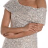 Close-up of the pleated one shoulder drape on a champagne sequin dress Close-up of the pleated one shoulder drape on a champagne sequin dress