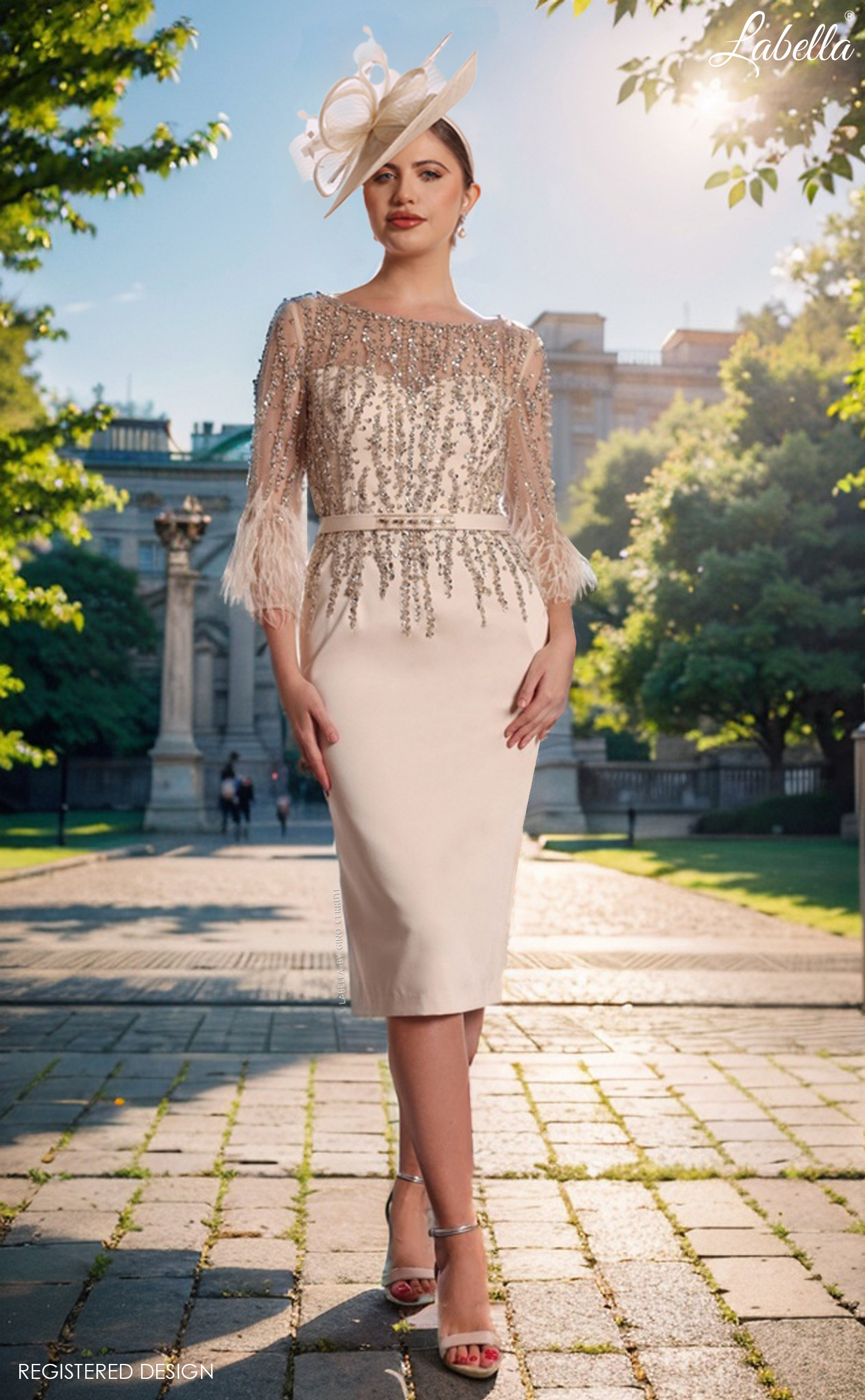 Gino Cerruti Eve champagne mother of the bride dress with feather sleeves, full-length front view Gino Cerruti Eve champagne mother of the bride dress with feather sleeves, full-length front view