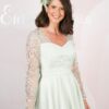 Sheer embroidered lace sleeves on a mint green mother of the bride dress