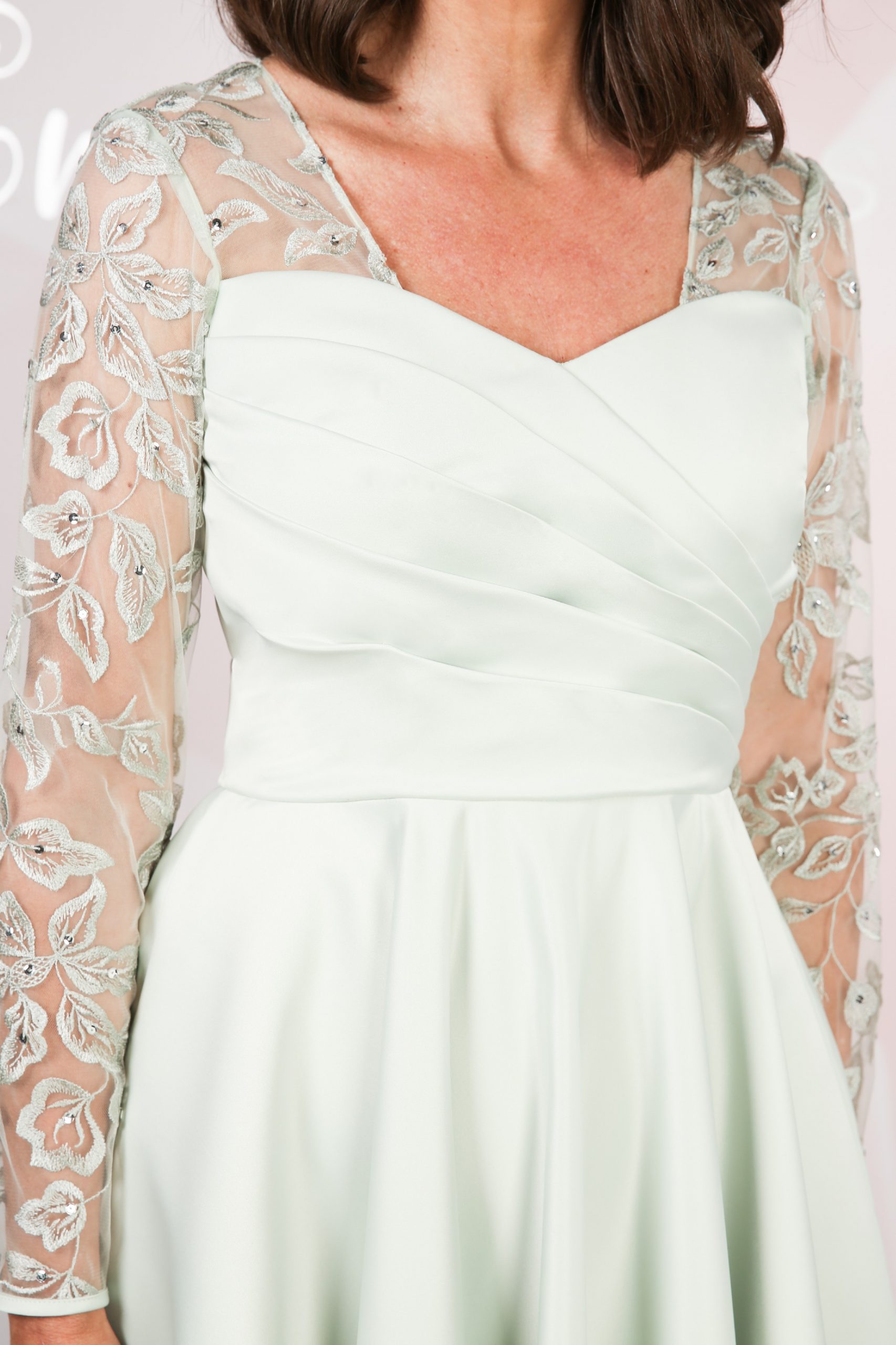 Pleated sweetheart bodice and lace neckline, close up